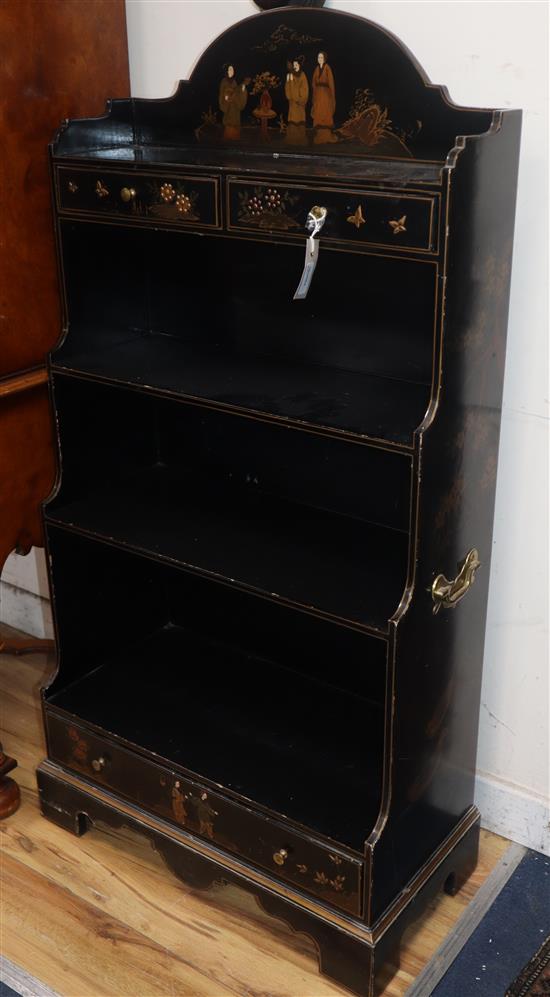 A chinoiserie black-laquered waterfall bookcase H.120cm